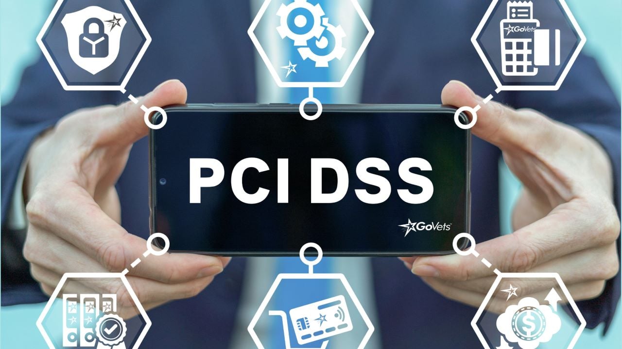 Ensuring PCI-DSS compliance - Person holding PCI compliant mobile phone